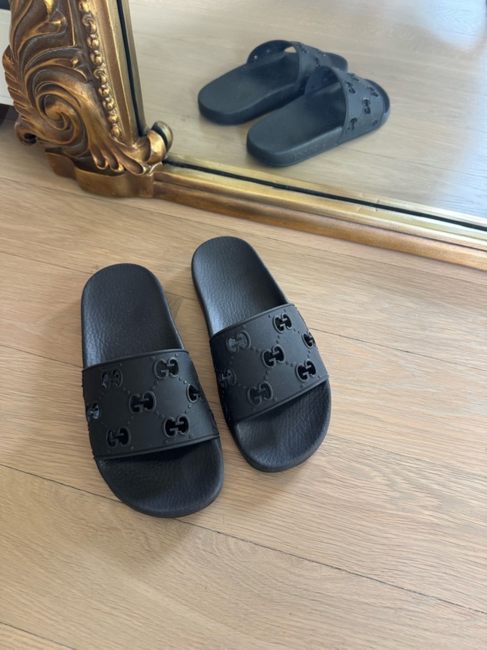 Gucci Black Embossed GG Slide Sandals